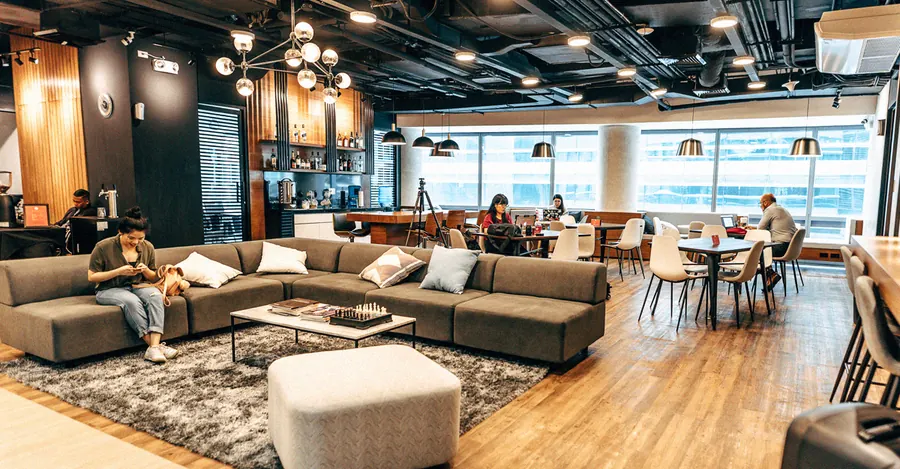 Lounge with sofas under pendant lights