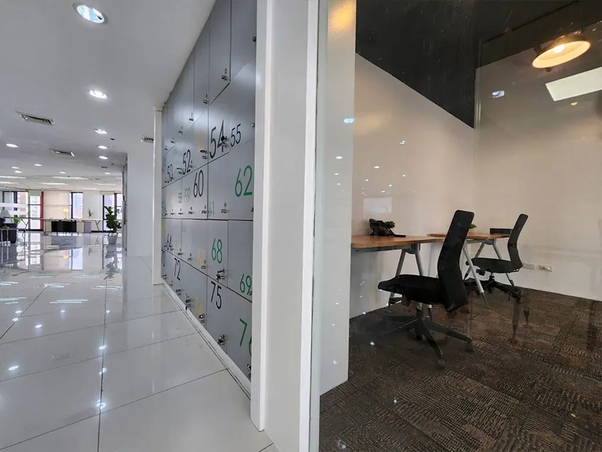 Workspace corridor with a whiteboard wall