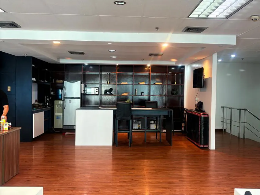 Lounge and pantry area with wooden floors