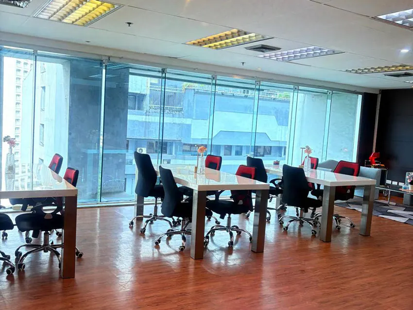 Open workspace with window-side desks